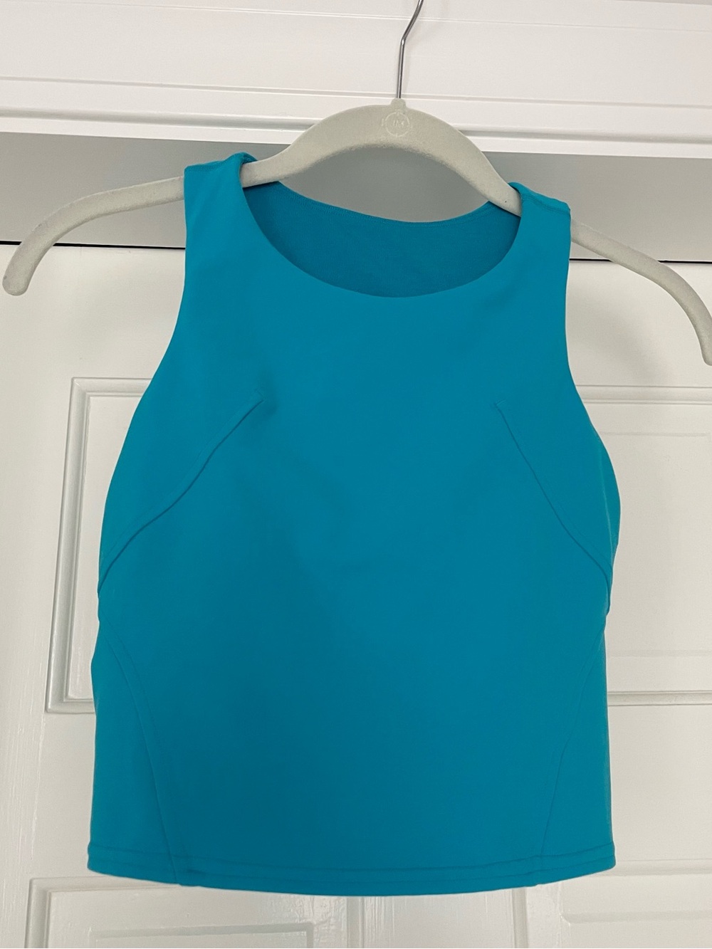 Lululemon Women's Wunder
Train Racerback High
Neck Cropped Blue Tank Size 4